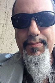 John El Manahi